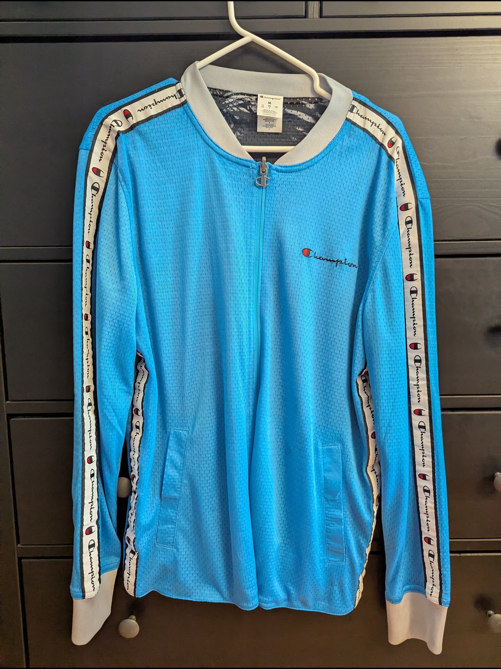 Champion's Reversible Mesh Track Jacket - Hotline Blue/Blur Tropics